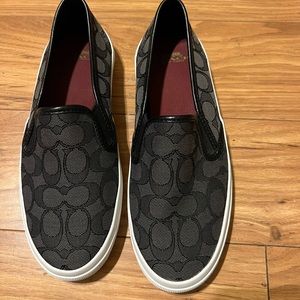 Coach slides. Comfortable too. Only worn a couple times.